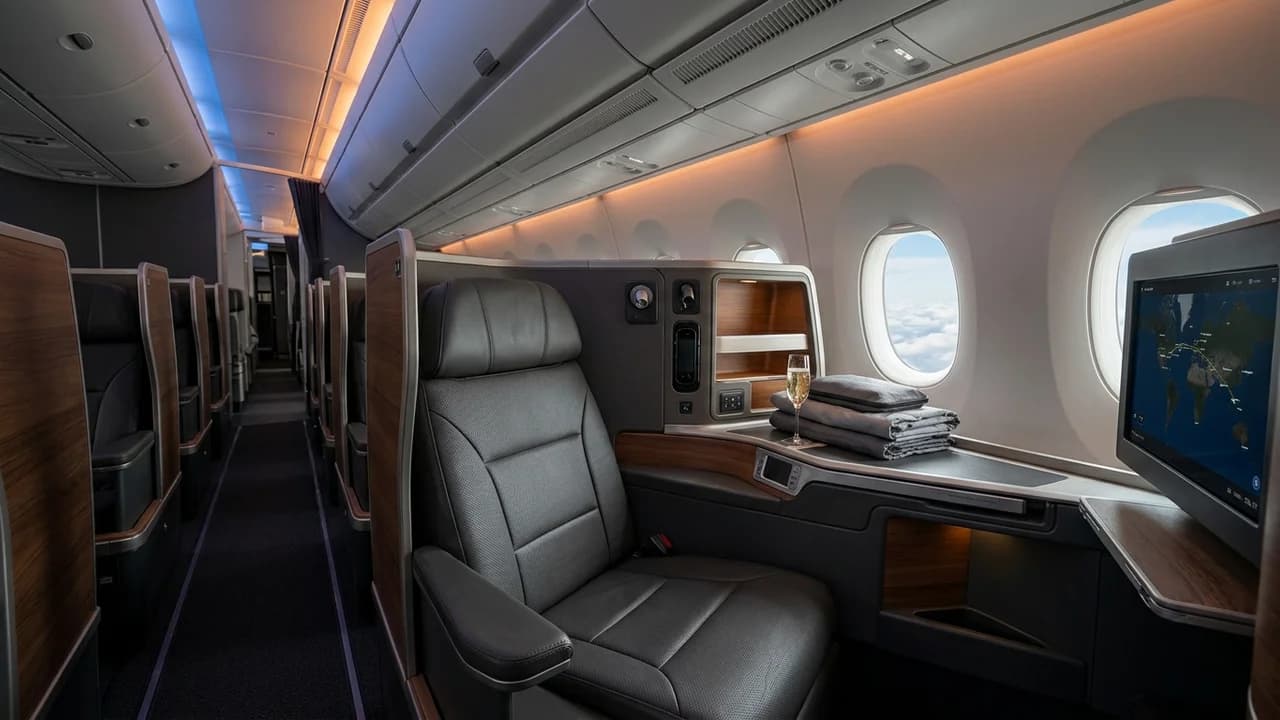 Air India business class cabin with lie-flat suite and premium amenities