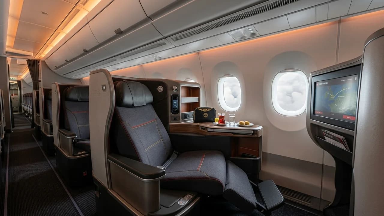 Turkish Airlines business class cabin with lie-flat suite and premium amenities