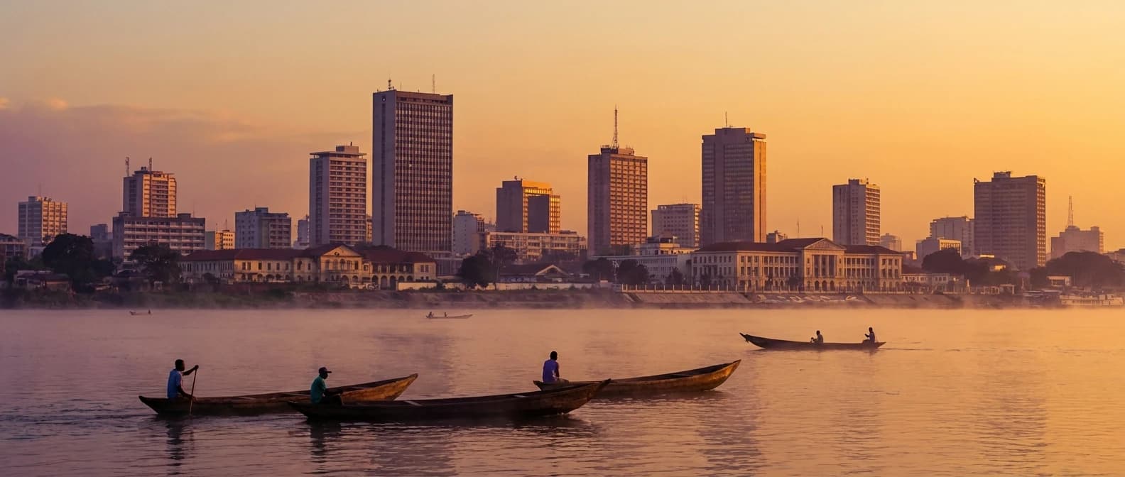 Congo River panorama with Kinshasa skyline at golden hour