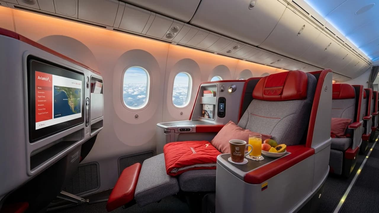 Avianca business class cabin with lie-flat suite and premium amenities